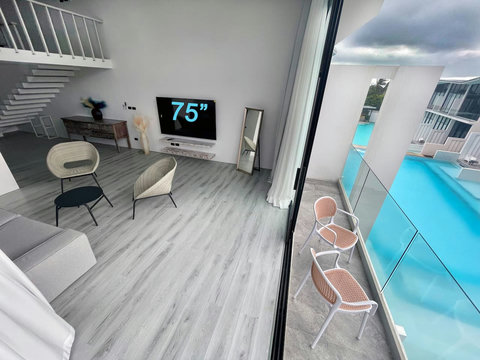 75-inch smart TV and poolside terrace at Villa Q1, Replay Residence Koh Samui