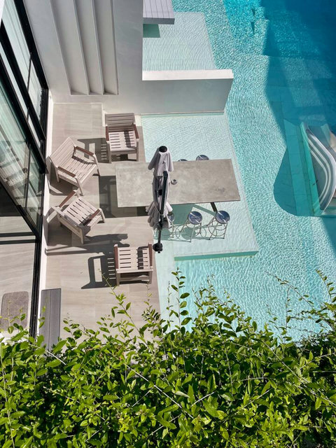 Poolside terrace with sea view umbrella at Villa Q1, Bangrak Koh Samui Thailand