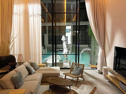 Spacious bedroom and living area inside Villa Q1, Bangrak Koh Samui holiday rental