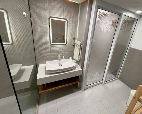Ensuite bathroom with modern fixtures at Villa Q1, Replay Residence Bangrak Koh Samui