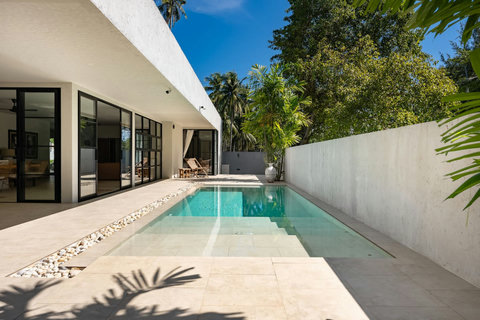 Covered sala overlooking the swimming pool