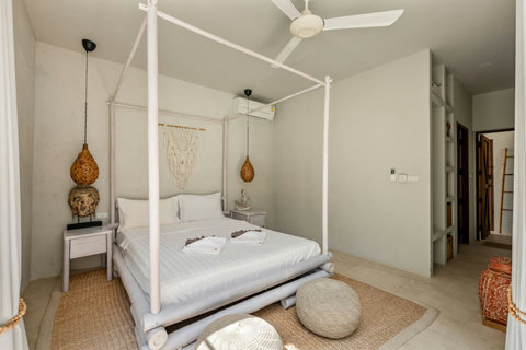 Elegant bedroom with romantic canopy bed