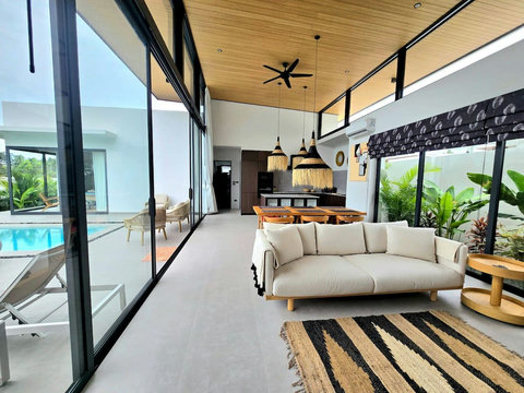 Bedroom with elegant canopy bed and garden view