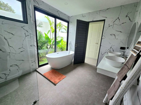 Dressing area with vanity mirror and natural light