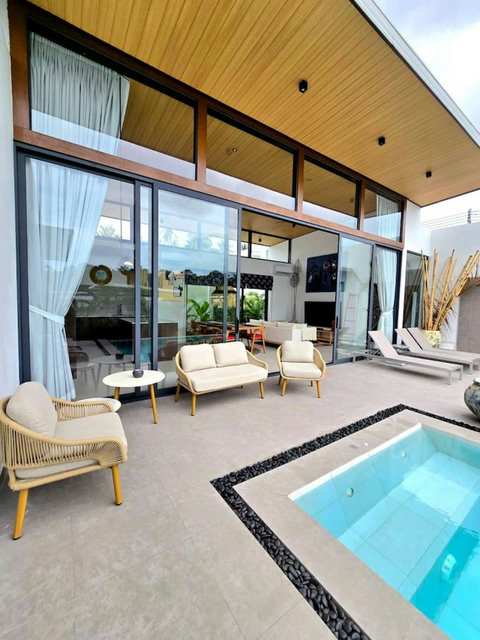 Poolside terrace with comfortable lounge seating
