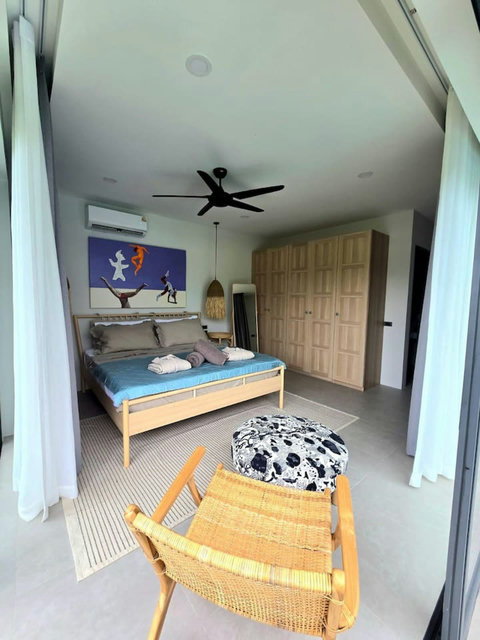 Fun kids bedroom with colorful decor and ceiling fan