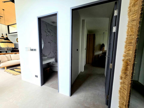 Modern hallway with mirrored closet and sleek design