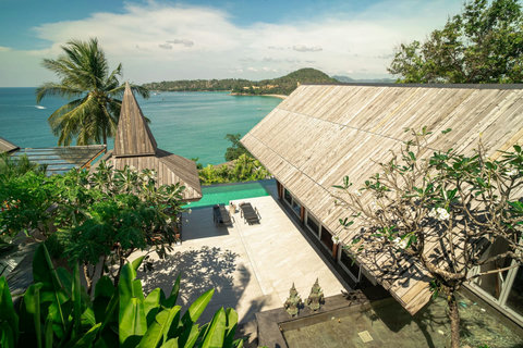 Sun deck with loungers and sweeping ocean views at Laemsingh Villa, Surin Beach Phuket