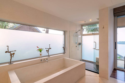 Spa-style soaking tub in luxury bathroom at Laemsingh Villa, Phuket Thailand