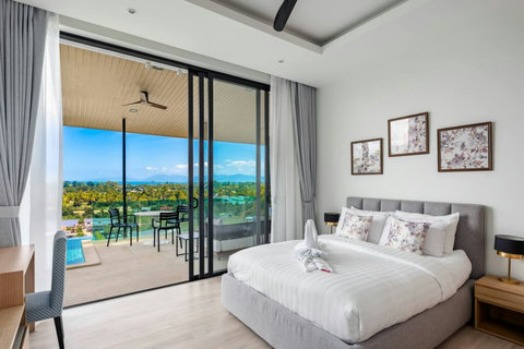 Sea view bedroom with balcony access and natural light at Villa Ombra, Mae Nam Koh Samui