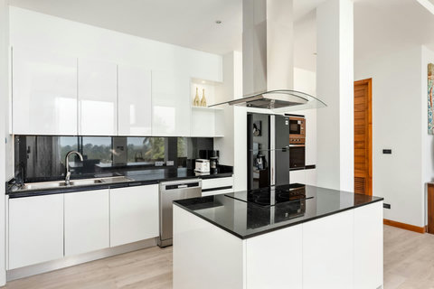 Fully equipped modern kitchen with premium appliances at Villa Ombra, Koh Samui vacation home