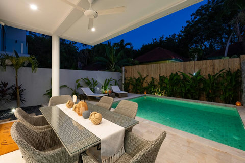 Imagine dining by starlight at your own private table steps from the glowing pool, tropical breezes and twinkling lights creating pure magic.