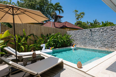 Your private tropical oasis with comfortable lounging spots under shade. Spend days floating and reading by the water.