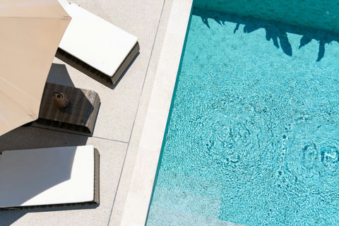 Dive into your very own turquoise pool, perfectly positioned for lazy afternoons and morning swims.