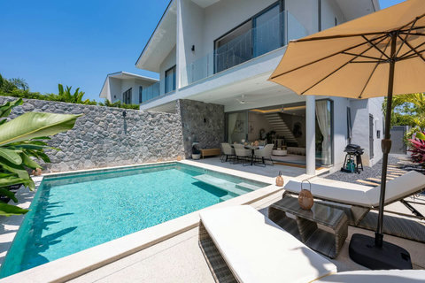 Dine al fresco under the shade of a parasol with views of your pool. Meals taste better in the open air.