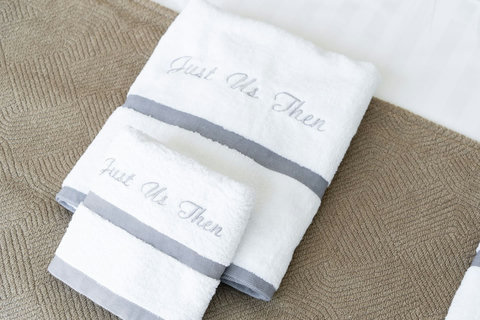 Wrap yourself in luxe—our signature white towels embroidered with a personal touch make you feel truly welcomed and cared for.