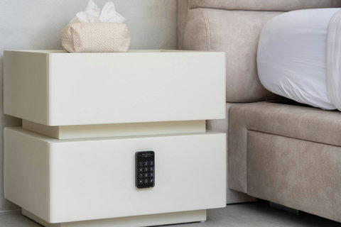 Peace of mind comes standard—your own private digital safe is tucked discreetly into the bedside table, ready to protect your essentials.