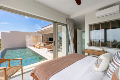 Bedroom with direct pool access and indoor-outdoor flow