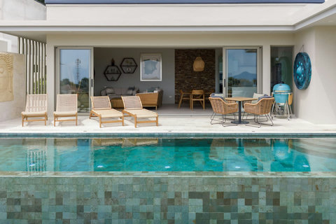 Open-air pool with seamless living/dining space