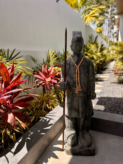 Tropical garden detail at Villa Amala – lush plants line the pathway in this Koh Samui pool villa.
