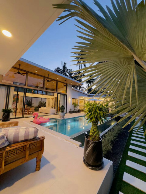 Private pool and tropical garden at Villa Amala – fun flamingo float in your 3BR Koh Samui pool villa in Mae Nam.