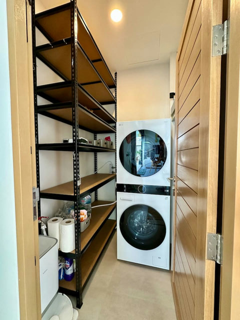 Laundry area with washer-dryer for long stays at Villa Amala 3BR pool villa Koh Samui.