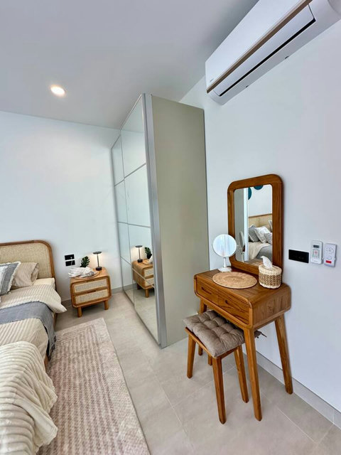 Comfortable bedroom interior at Villa Amala 3BR pool villa Mae Nam Koh Samui.