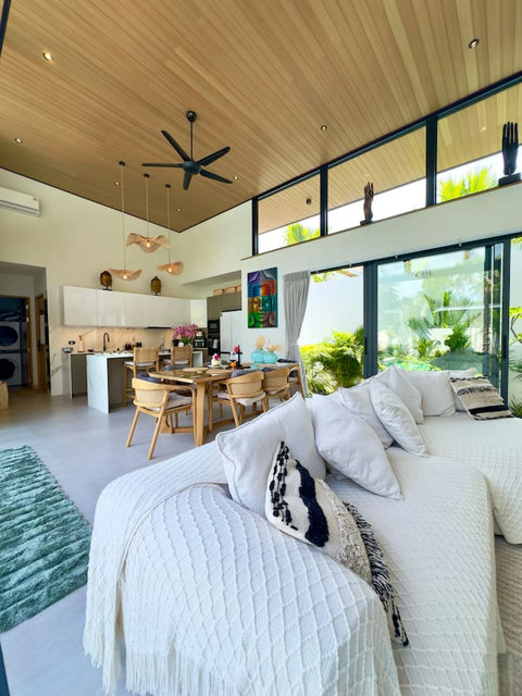 Living and kitchen flowing together at Villa Amala – open-plan 3BR pool villa Koh Samui.