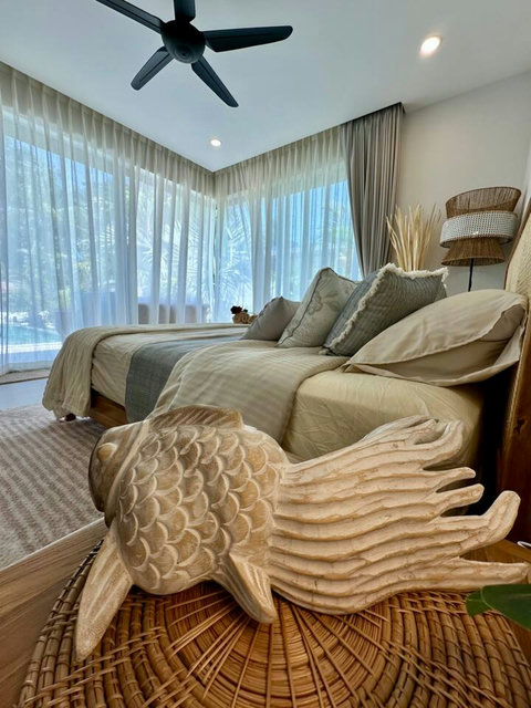 Plush bedding and natural light at Villa Amala 3BR pool villa Koh Samui.