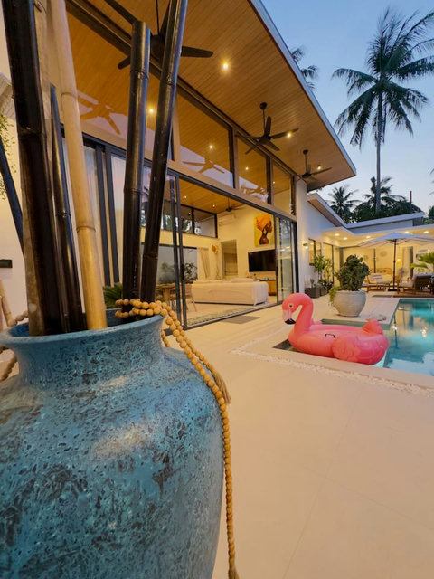 Indoor-outdoor living at Villa Amala – lounge area opens to private pool, 3BR Koh Samui pool villa.