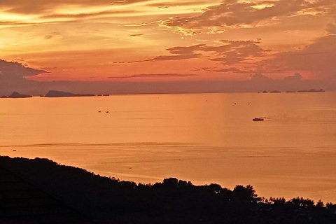 Sunset View A breathtaking golden hour panorama from the villa, capturing the mesmerizing sunset colors fading over the ocean