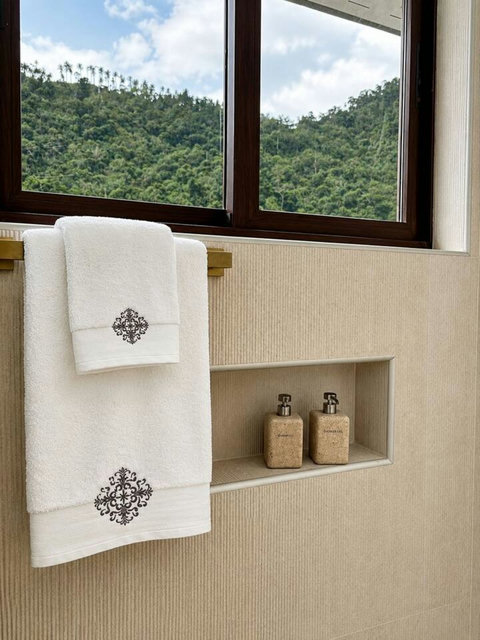 “Complimentary toiletries and bathroom essentials provided at our Koh Samui pool villa”