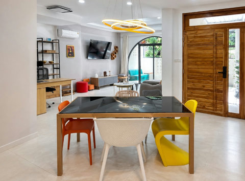Gather around this stylish dining table for shared meals and good conversation with your travel companions.