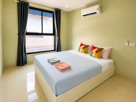 A welcoming second bedroom for guests or family members.