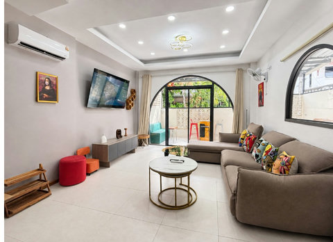Settle into this bright, airy living room—the heart of the home where you'll relax between adventures.