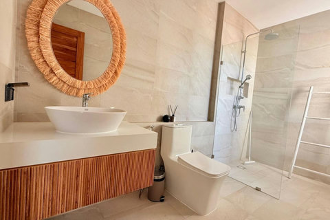 Modern ensuite bathroom with walk-in shower at Villa Jo, Koh Samui