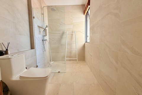 Spacious walk-in shower in a modern ensuite bathroom at Villa Jo, Koh Samui