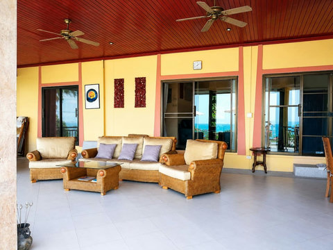 Sink into outdoor seating while the breeze carries the scent of tropical flowers and ocean air.
