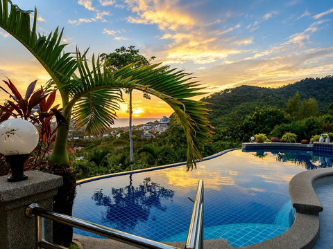 Watch the sky ignite with colour as the sun dips below the horizon. This view is your evening ritual.