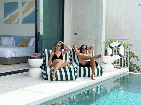 Relax on comfortable poolside loungers and enjoy the peaceful tropical atmosphere at Villa La Lay, Koh Samui.