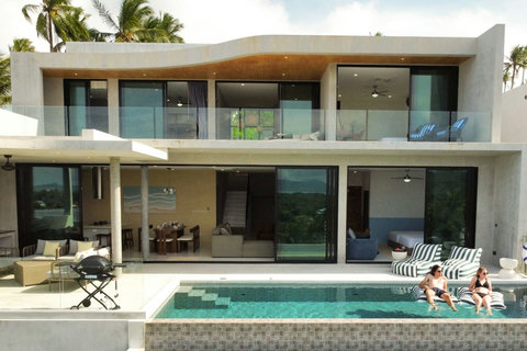 Covered outdoor terrace connecting the living area with the private swimming pool.