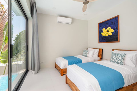 Comfortable twin bedrooms with two single beds ,ideal for friends or children sharing