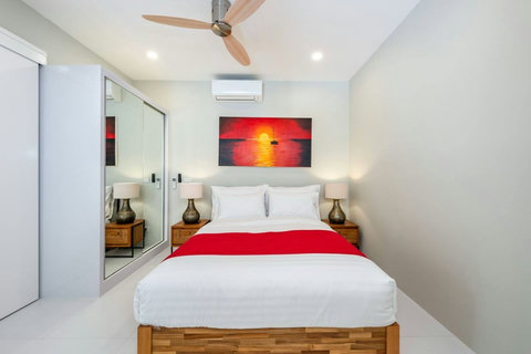 A cosy second bedroom with its own cool, quiet space for restful nights.