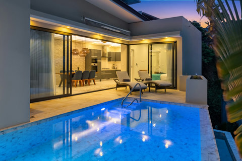 Watch the sky change color as you float in your pool, with all the villa's comforts just a step away.