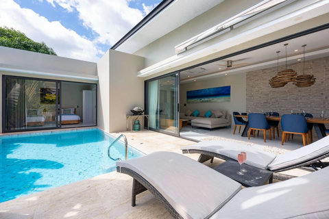 Your own private retreat from above — pool, gardens, and ocean views all at once.
