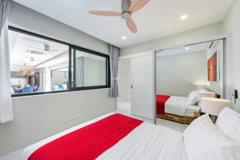 A guest bedroom offering comfort and privacy for a restful island retreat.