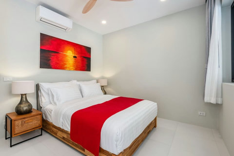 A clean, modern bathroom with hot shower to refresh after beach days and adventures.