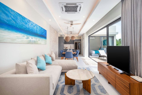 Sink into the sofa with a cool drink and catch your favourite shows or just rest.