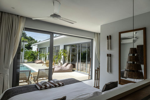 Bedroom view straight onto the pool and loungers
