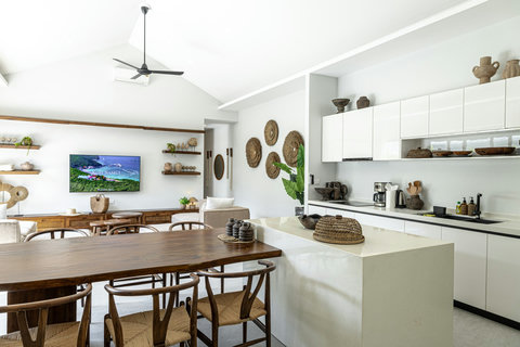 Dining table beside the kitchen island